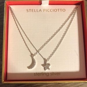 Brand new. Sterling silver moon and star necklace